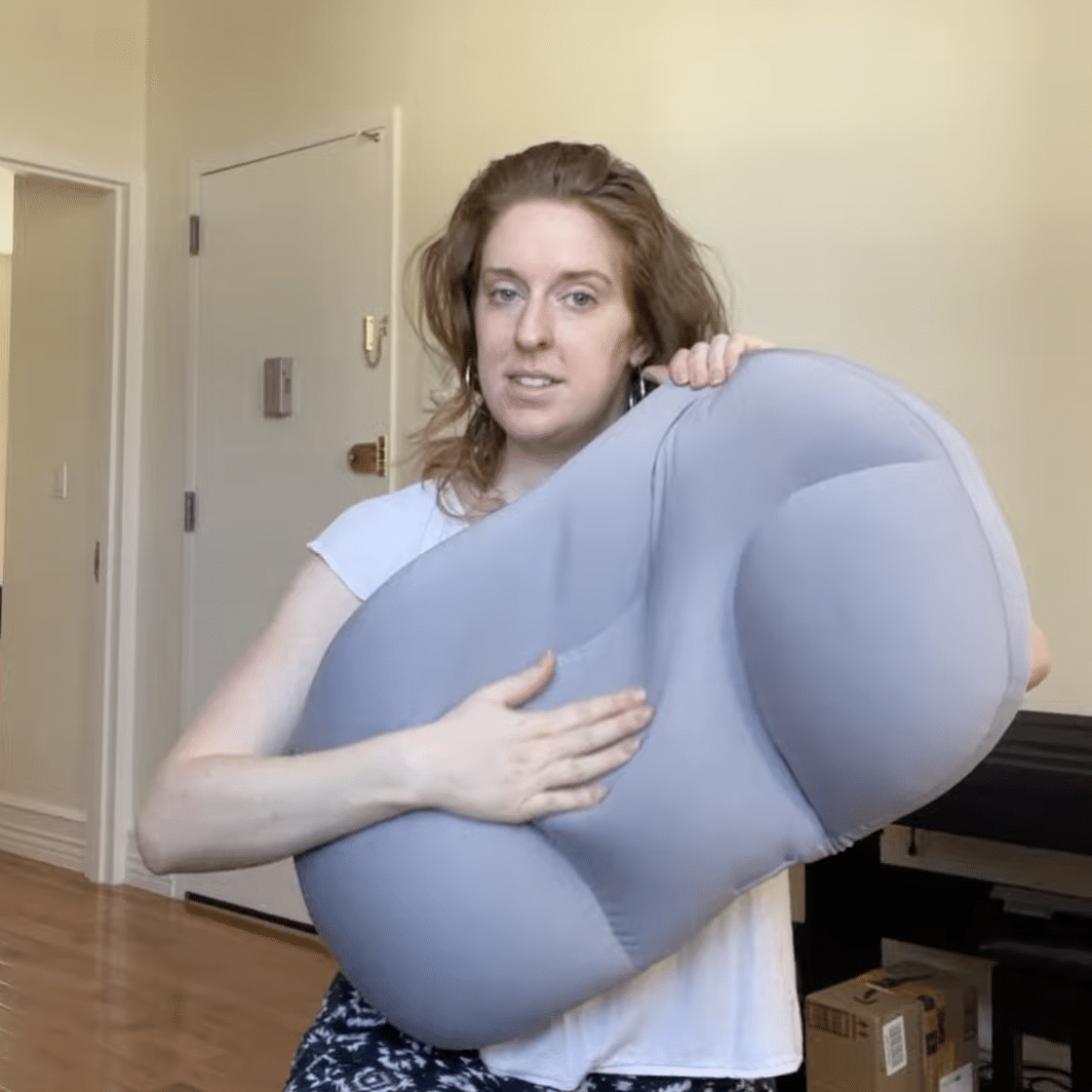 Holding Necklow pillow